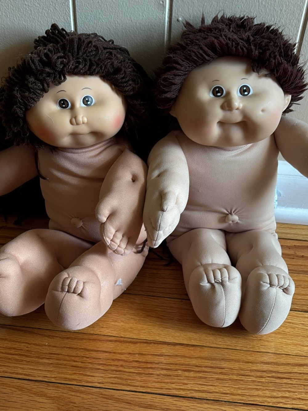 Pair of Neutral-Skinned Cloth Baby Dolls with Brown Yarn Hair